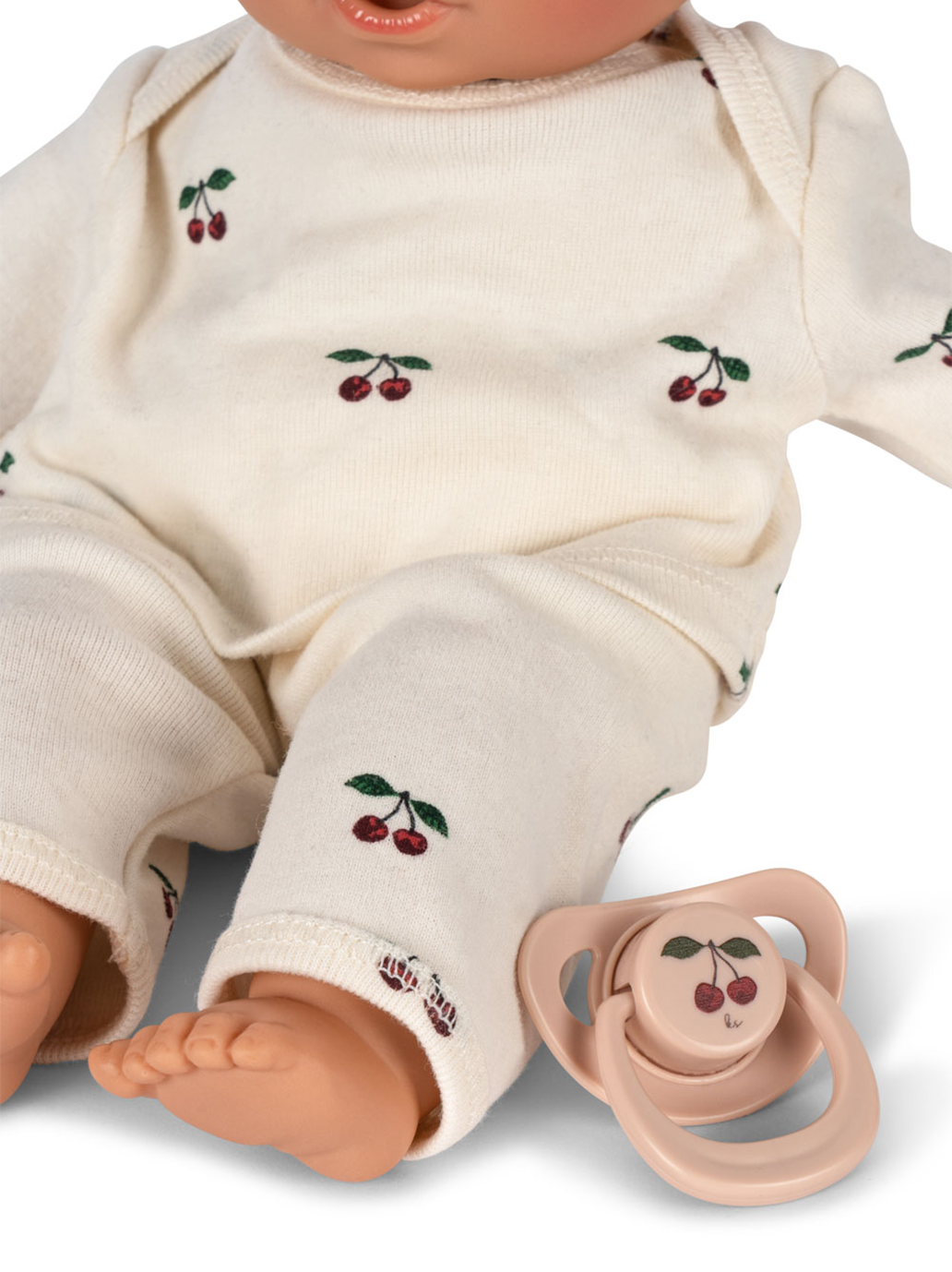 Lalka z miękkim brzuszkiem, ubrankiem i smoczkiem Konges Slojd BÉBÉ Concept