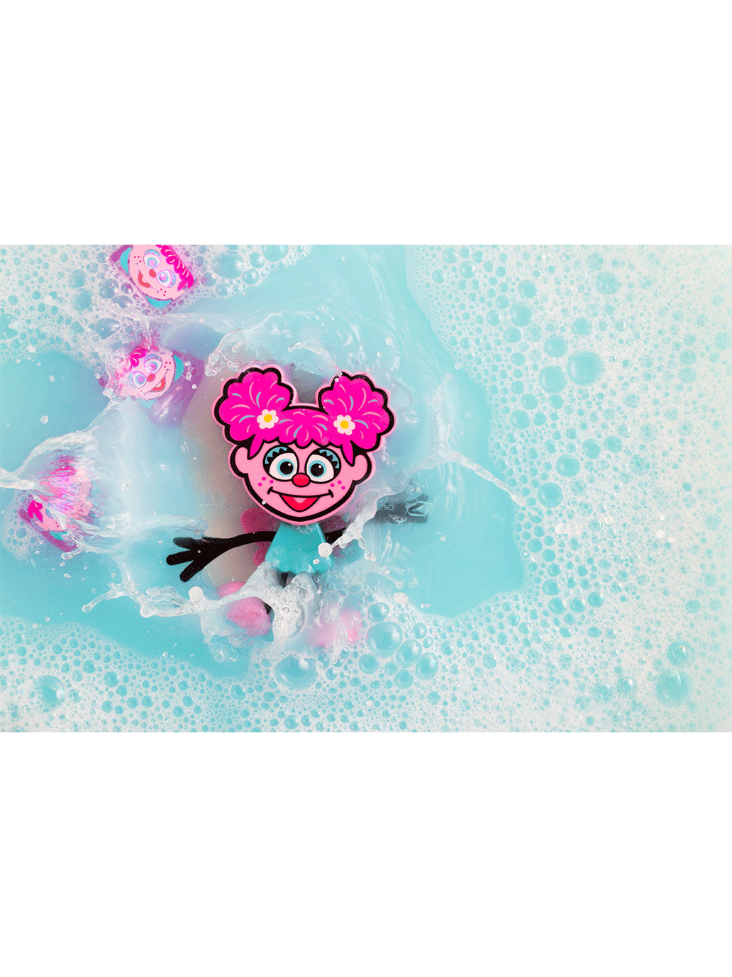 Kostki sensoryczne świecące w wodzie z ludzikiem Ulica Sezamkowa Glo Pals BÉBÉ Concept