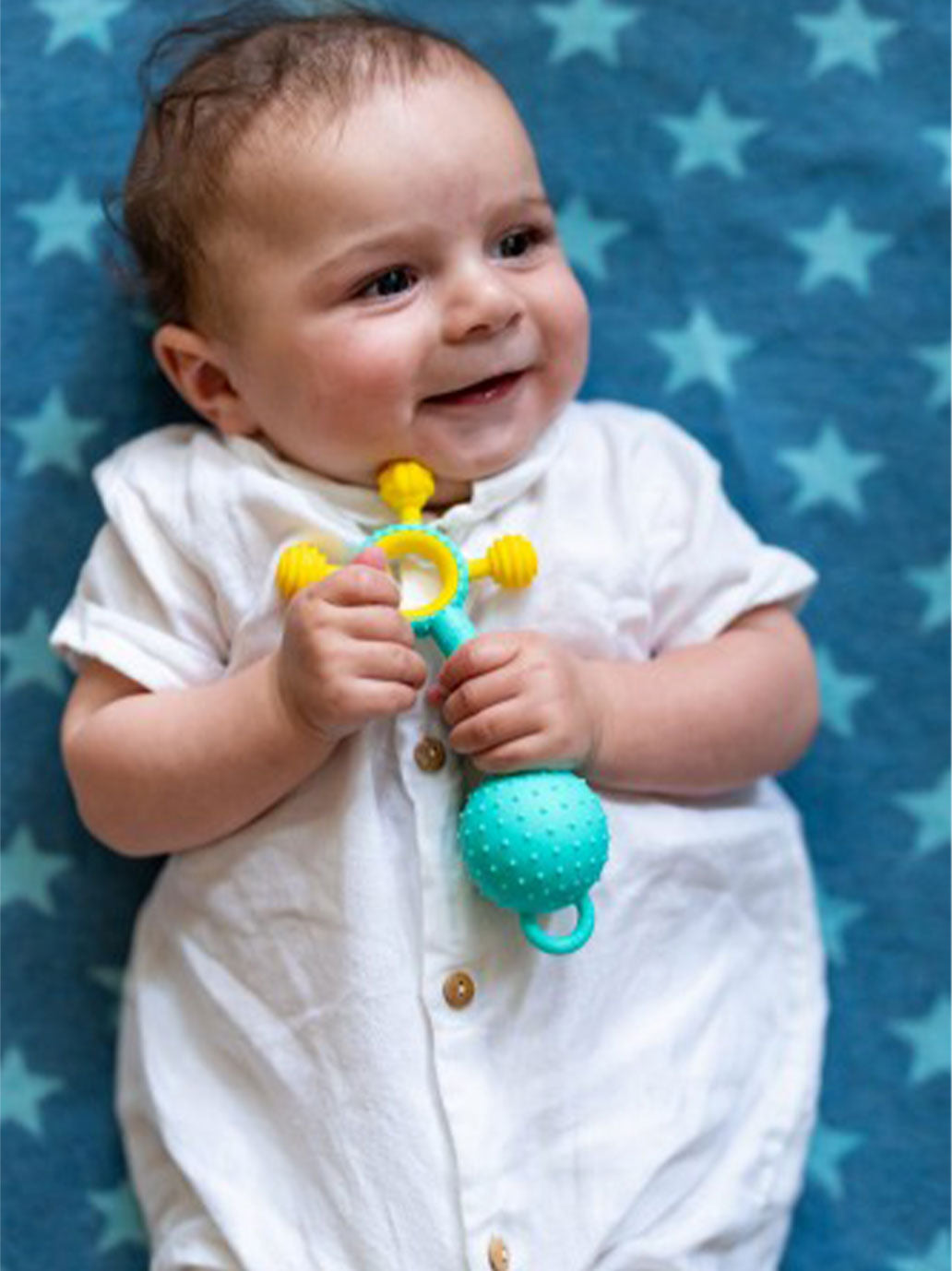 Silikonowy gryzak z grzechotką Gumlii Mobi BÉBÉ Concept