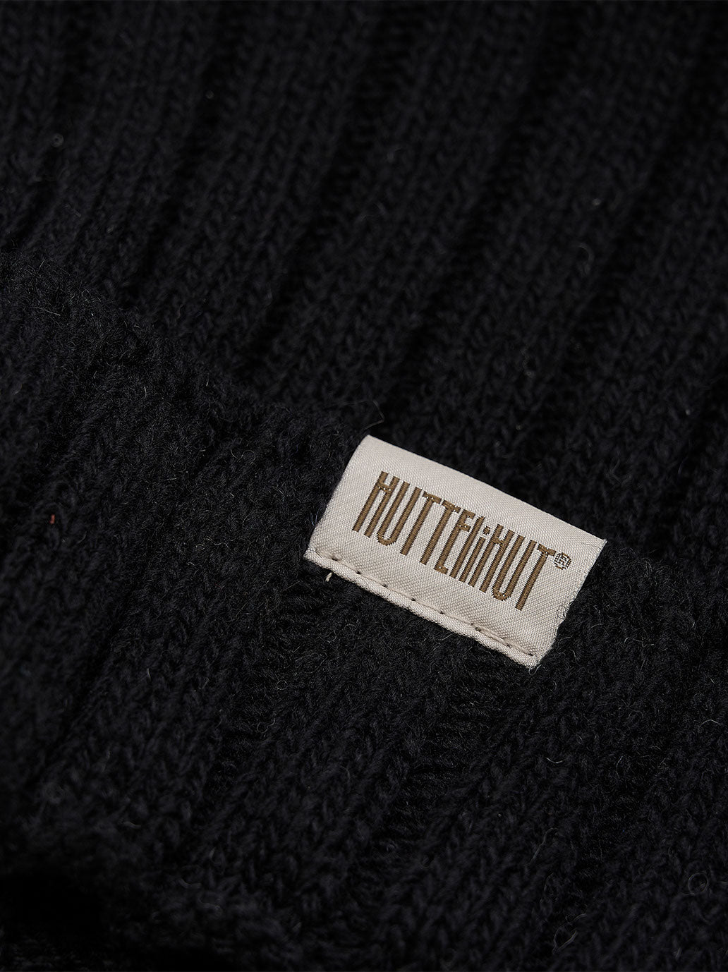 Wełniana czapka z pomponem z alpaki Huttelihut BÉBÉ Concept