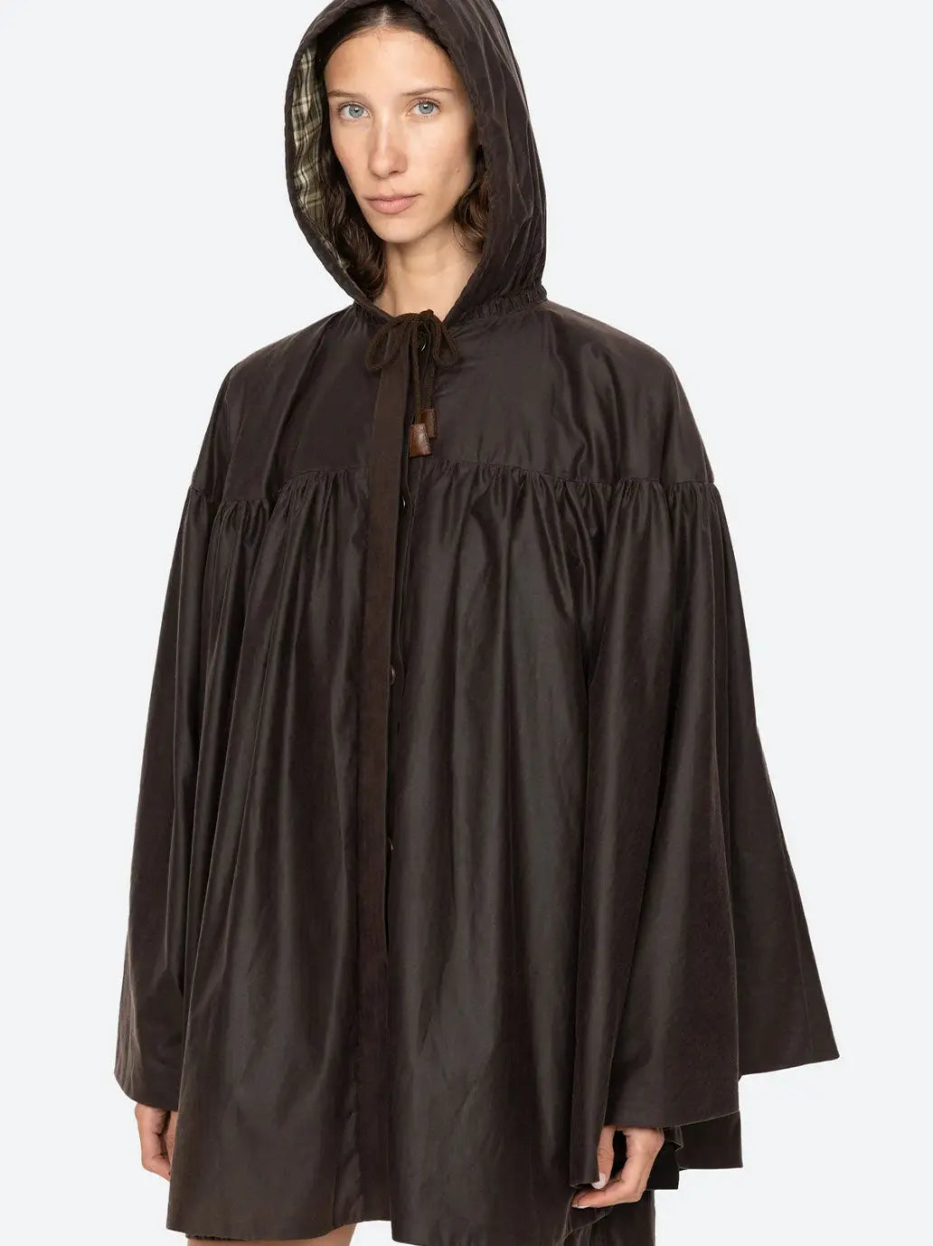 Quentin Solid Poncho SEA New York BEBE Concept