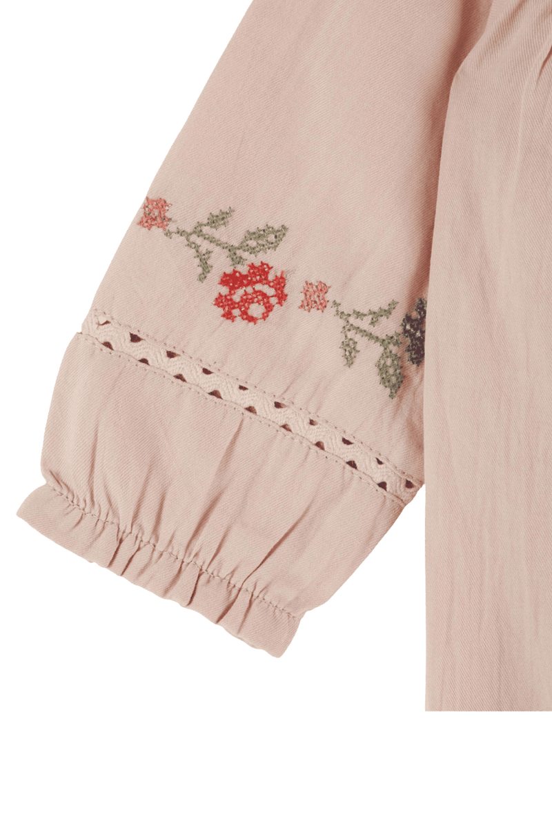 Elegante body de bebé con bordado