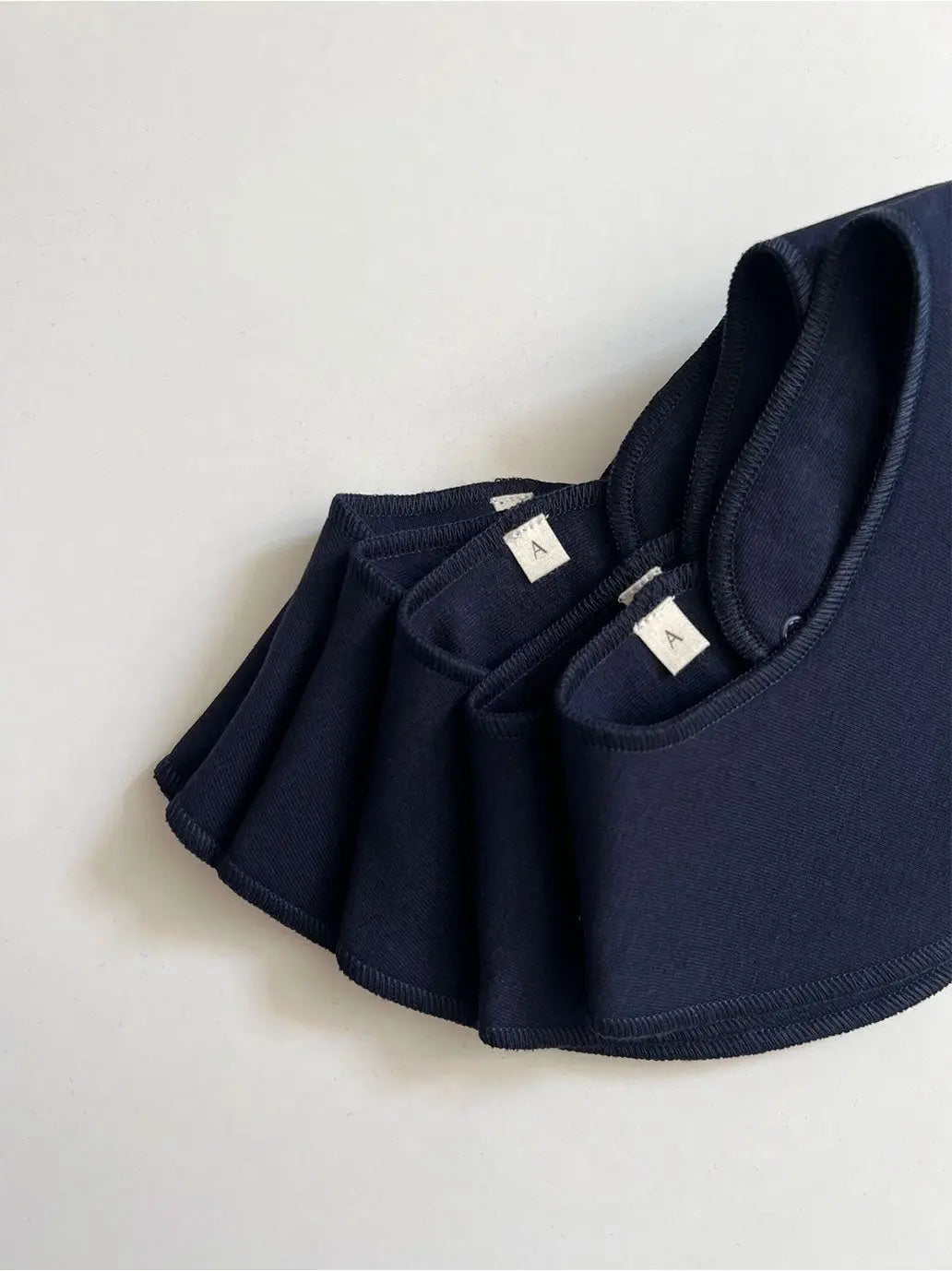 Miękki śliniak niemowlęcy Baby Bib A Basic Brand BEBE Concept 
