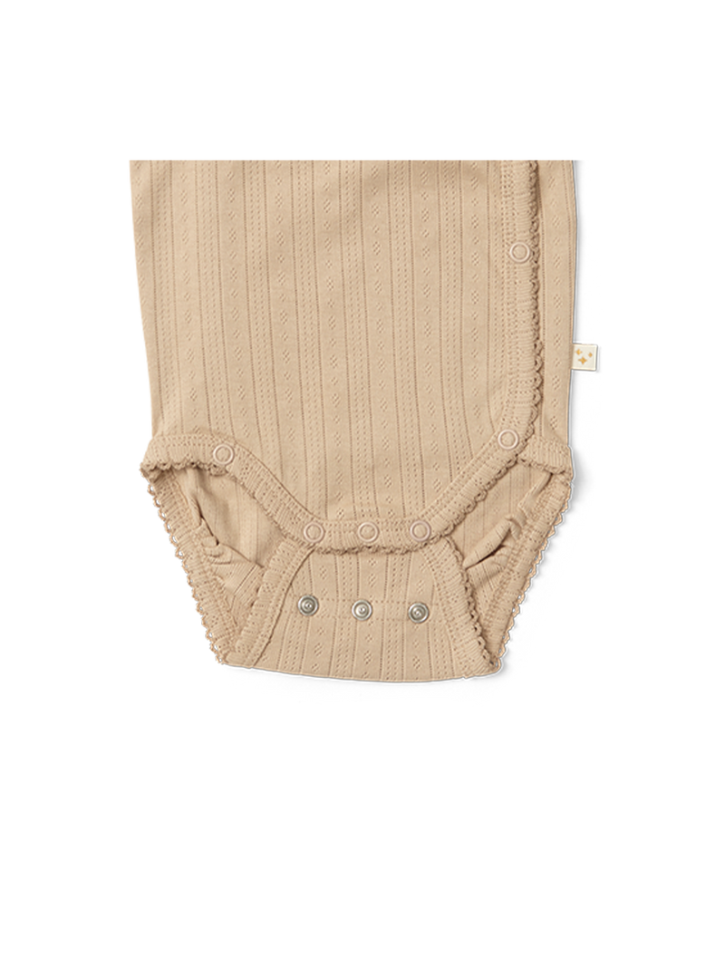 Body z tkaniny pointelle rosnące z dzieckiem Aron That's Mine BÉBÉ Concept