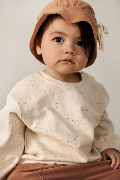 Dětský svetr s pokleslým ramenem