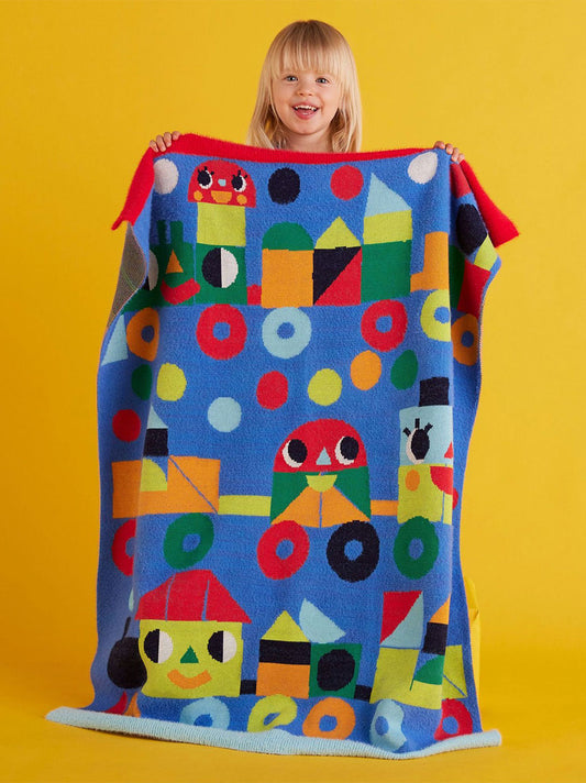 Měkká deka s barevným vzorem