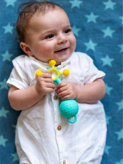 Silikonowy gryzak z grzechotką Gumlii Mobi BÉBÉ Concept 