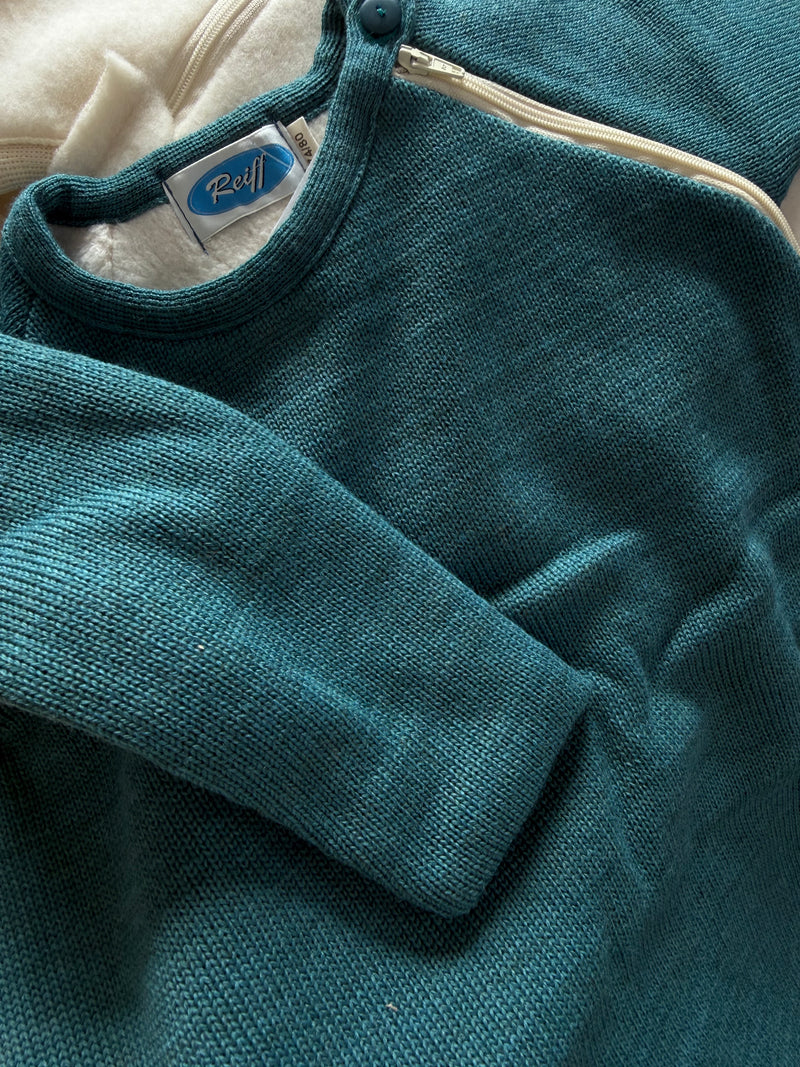 Saco de dormir para bebé de lana merino con forro de algodón.