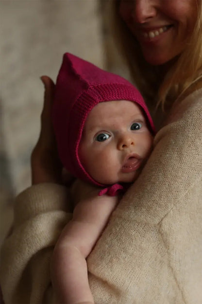 Czapeczka niemowlęca z wełny merino Pixie Bonnet Isidor FUCHSIA