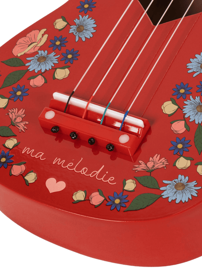 Drewniana gitara ukulele dla dzieci Konges Slojd BÉBÉ Concept 