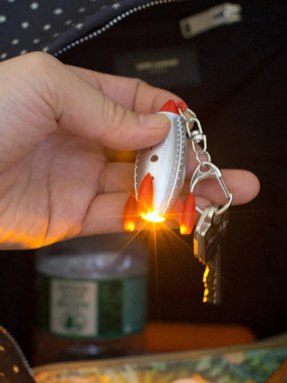 Breloczek interaktywny Kikkerland BÉBÉ Concept 