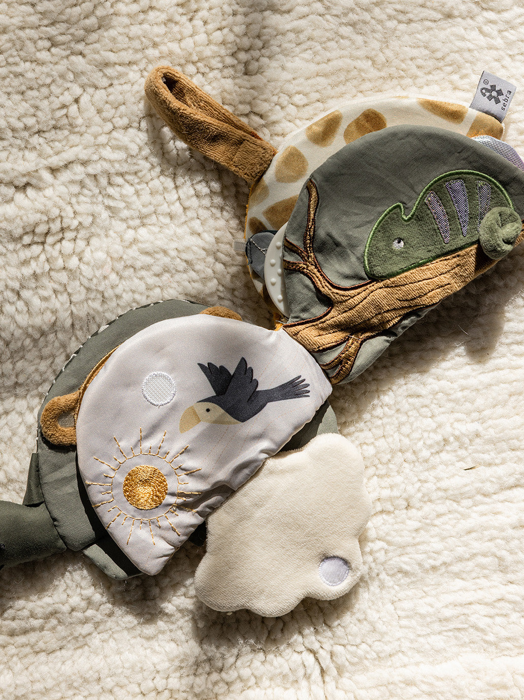 Sensoryczna książeczka Turbo Turtle Sebra BÉBÉ Concept 