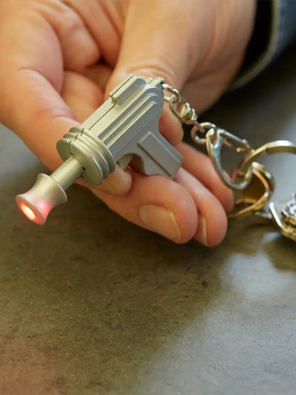 Breloczek interaktywny Kikkerland BÉBÉ Concept 